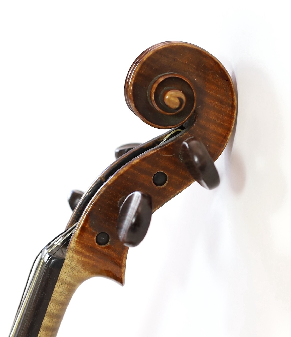 A violin, labelled Leandro Bisiach della Scuola Cremonese fece in Milano 1898, Piazzo del Duomo, length of back 35.6 cm (14in.) cased